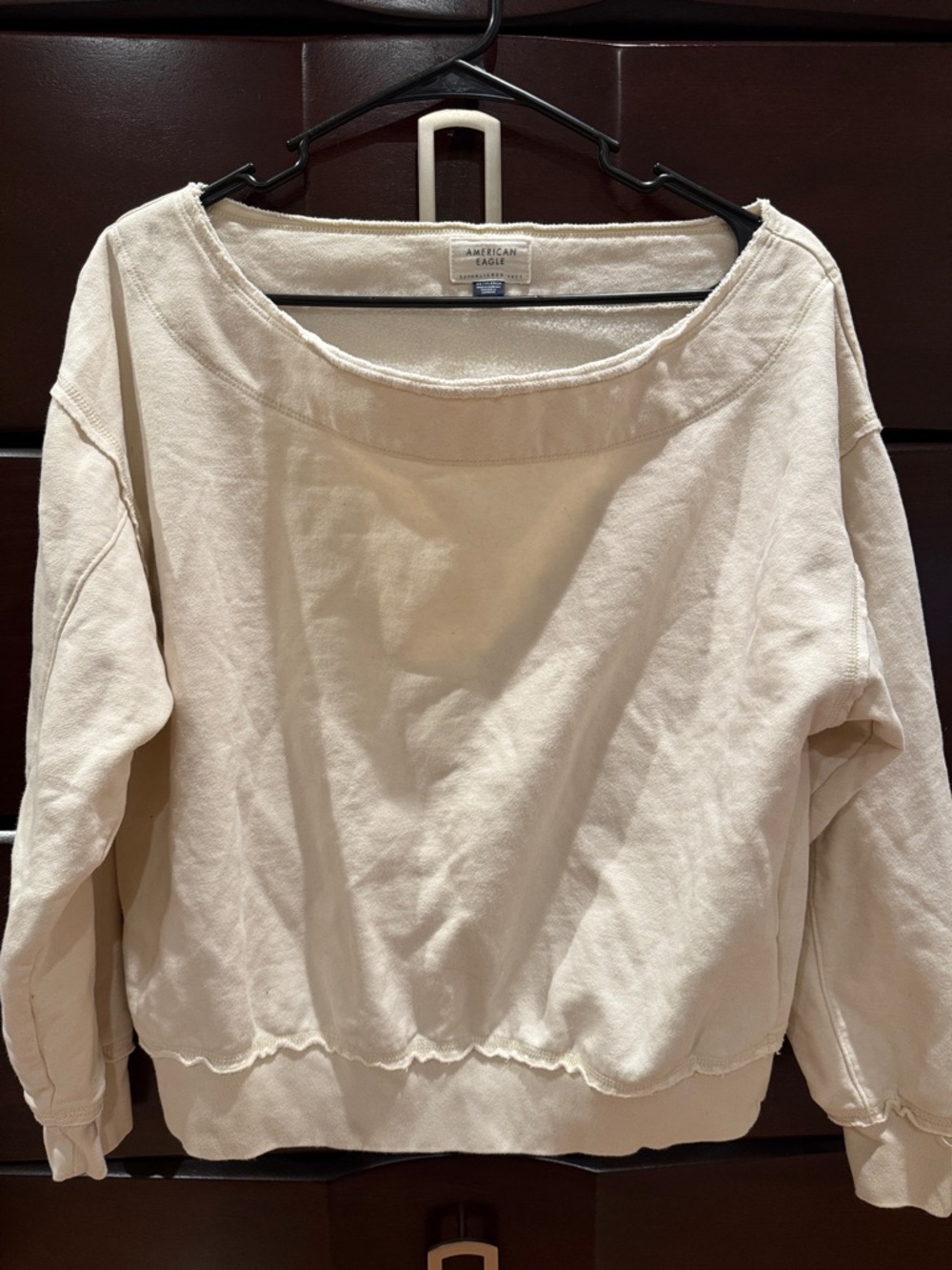 American Eagle Outfitters Off-the-Shoulder Sweatshirt in Cream